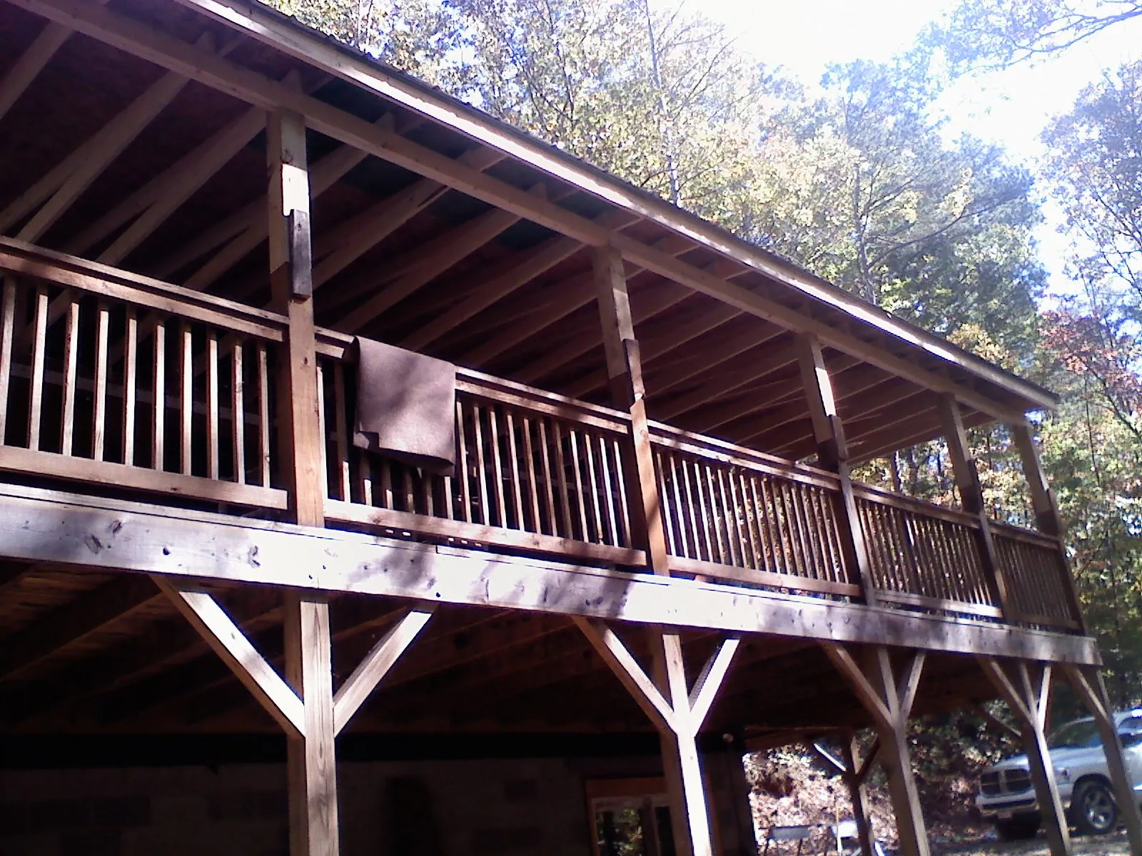 Timber framing under a new elevated porch and deck — Roof Leak Repair in Connersville by Roofing Brothers